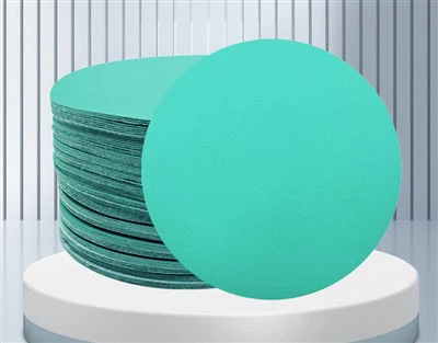 Adhesive sanding discs